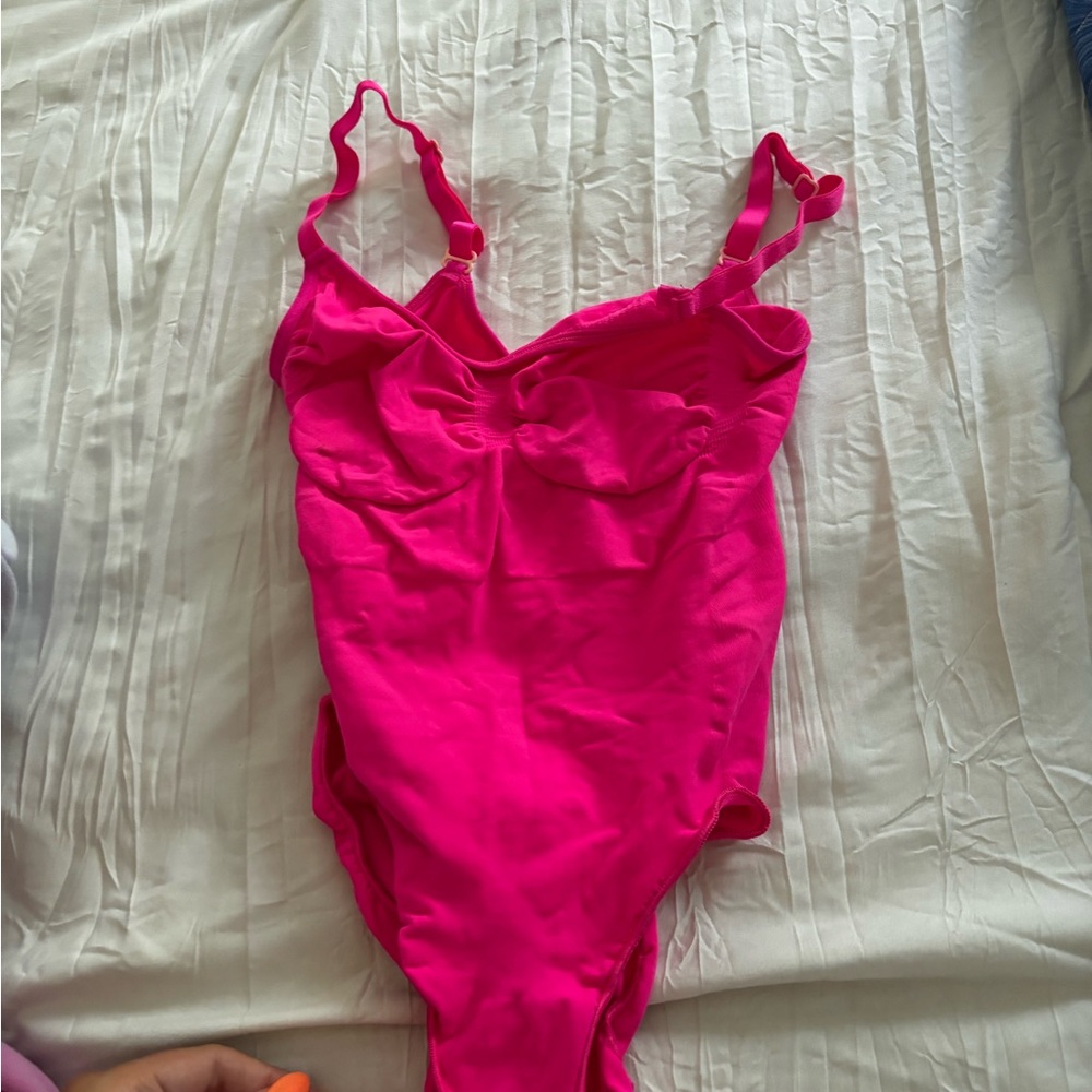 SKIMS hot pink seamless sculpt body suit